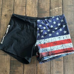 Born Primitive 2 in low rise workout shorts